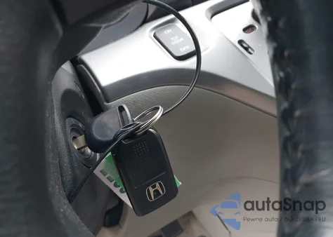 2010 Honda Odyssey Ex-L z USA, uszkodzony, nr VIN 5FNRL3H78AB044087